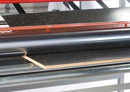 your material sample being bonded on the Advantage Laminiating System